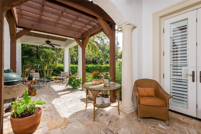 view of patio with a ceiling fan