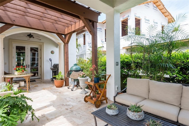 view of patio / terrace with area for grilling, ceiling fan, french doors, outdoor lounge area, and a pergola