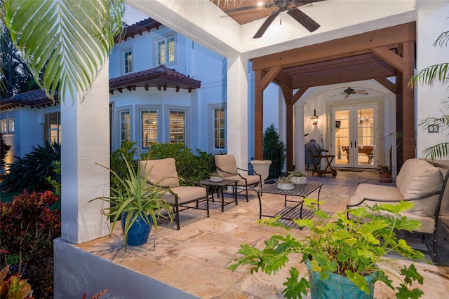 view of patio / terrace featuring a ceiling fan, french doors, and grilling area