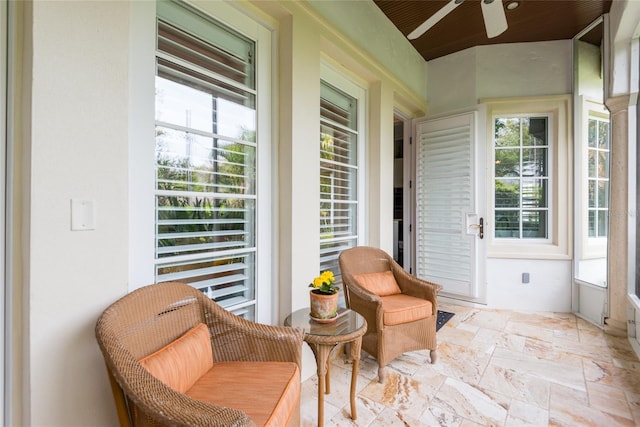 sunroom / solarium with ceiling fan