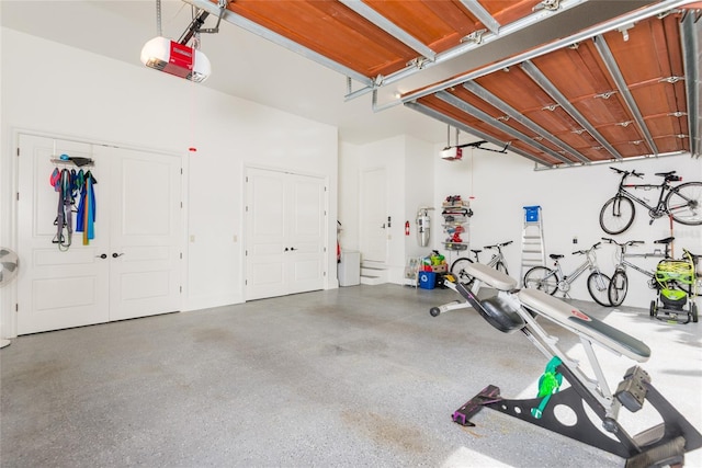 garage featuring a garage door opener