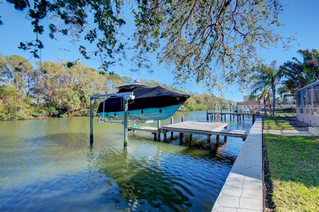 dock area featuring a water view and boat lift