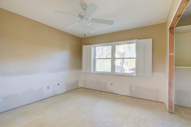 spare room featuring ceiling fan