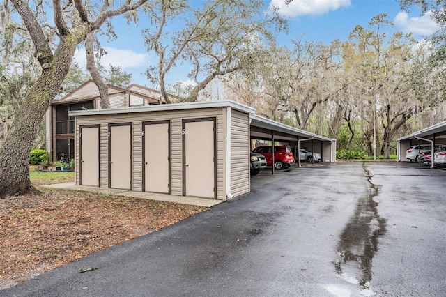 garage featuring covered parking