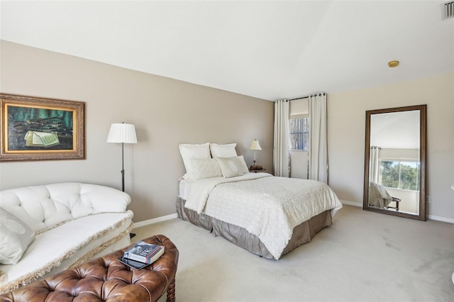 bedroom featuring light carpet, visible vents, and baseboards
