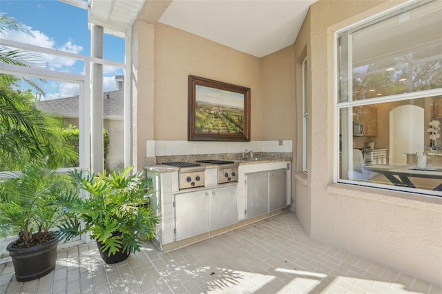 view of patio / terrace with exterior kitchen
