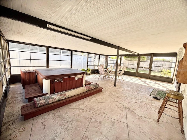 sunroom / solarium with a wealth of natural light