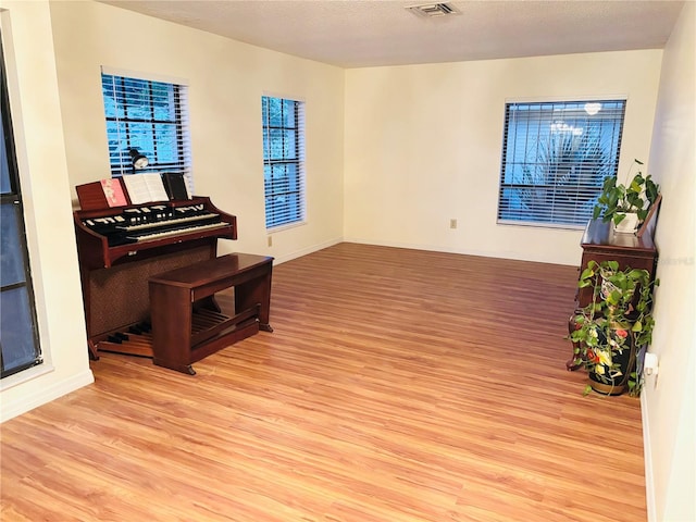15013 Redcliff Dr, Tampa, FL 33625 - unfurnished room featuring light wood finished floors