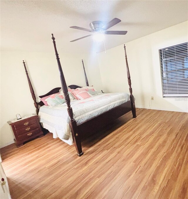 15013 Redcliff Dr, Tampa, FL 33625 - bedroom featuring light wood-style floors and a ceiling fan
