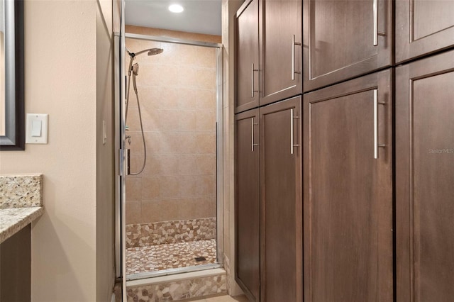 bathroom with a stall shower