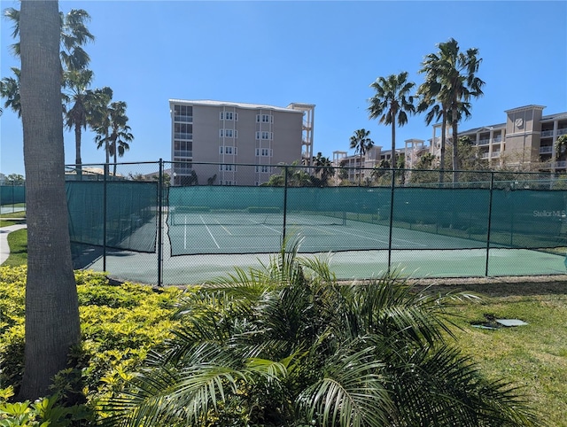 view of sport court with fence