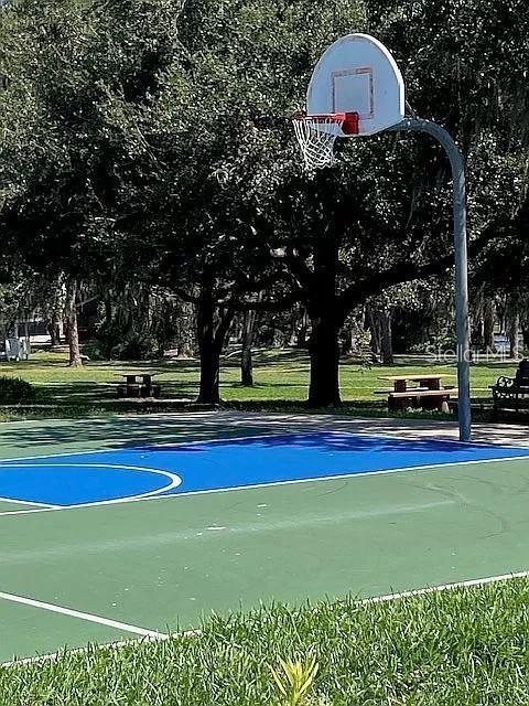 view of sport court featuring community basketball court