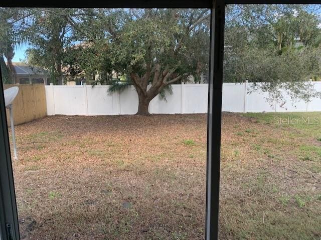 view of yard featuring a fenced backyard