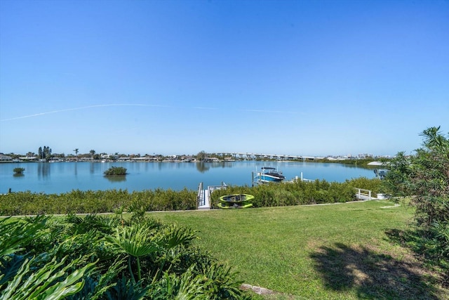 property view of water featuring a dock and boat lift