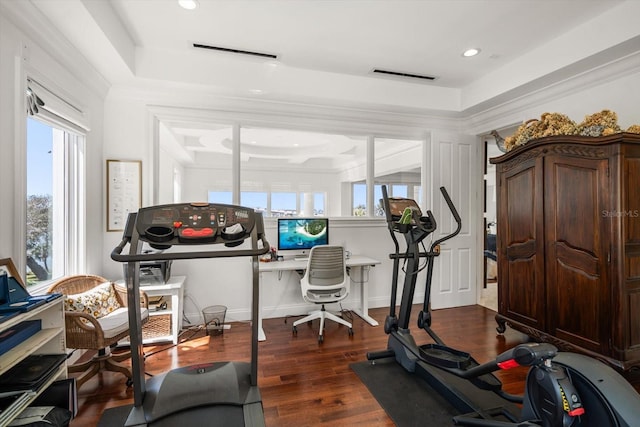 workout room with ornamental molding, visible vents, dark wood finished floors, and recessed lighting