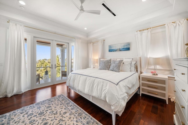 bedroom featuring dark wood-style floors, access to outside, french doors, and a ceiling fan