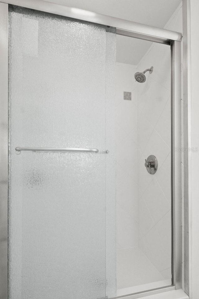 bathroom featuring a stall shower