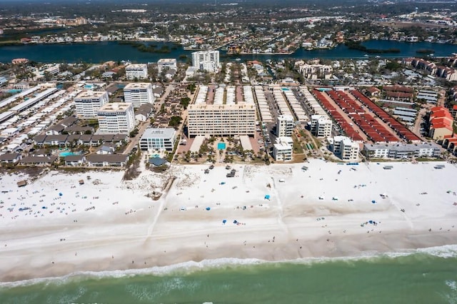 birds eye view of property with a water view and a view of city