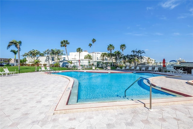 community pool with a patio