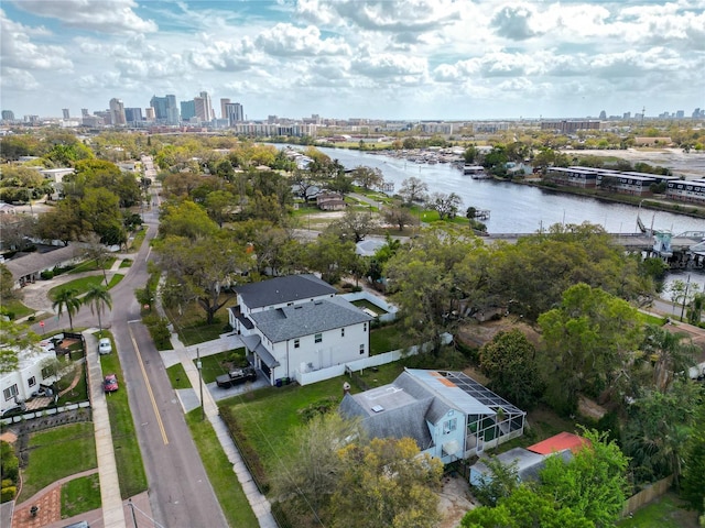 bird's eye view featuring a water view and a city view