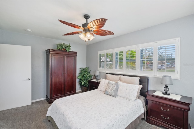 bedroom featuring carpet floors, ceiling fan, and baseboards