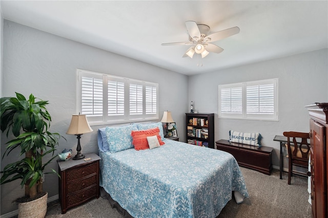 bedroom with carpet floors, ceiling fan, and baseboards