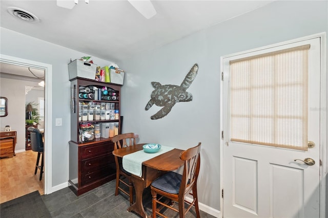 dining area with visible vents and baseboards