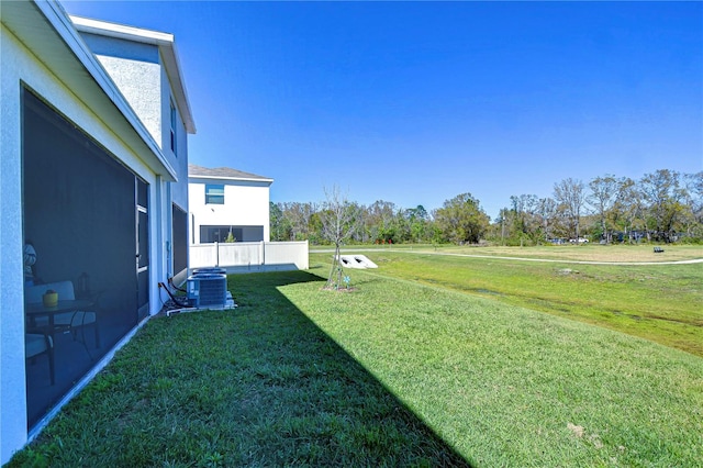 view of yard featuring central AC