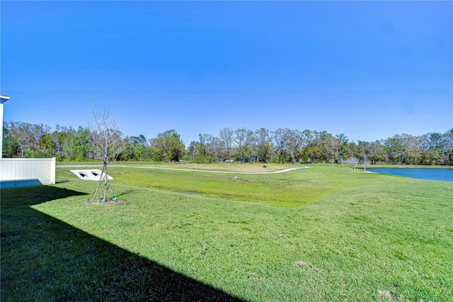 view of yard with a water view