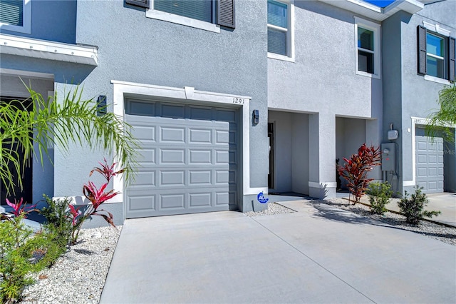 garage with driveway