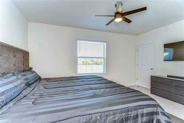 bedroom featuring carpet flooring and a ceiling fan