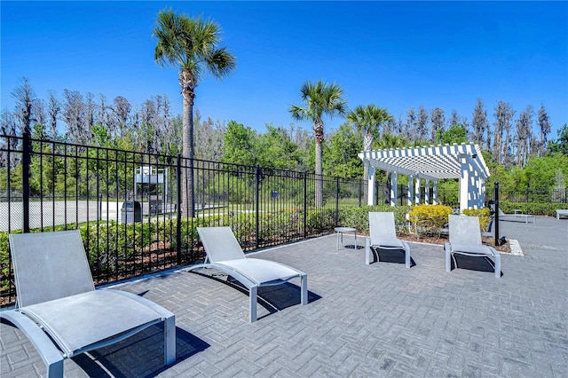 view of patio with fence and a pergola