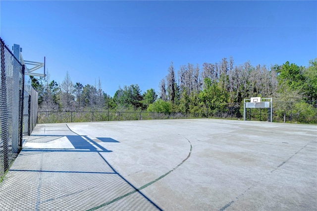 view of sport court with community basketball court and fence