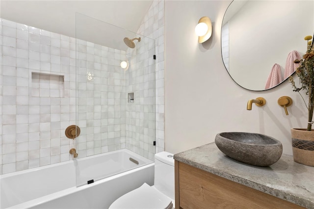 bathroom featuring shower / bathing tub combination, vanity, and toilet