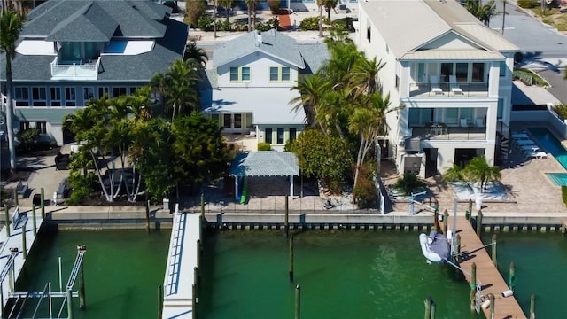 bird's eye view with a residential view and a water view