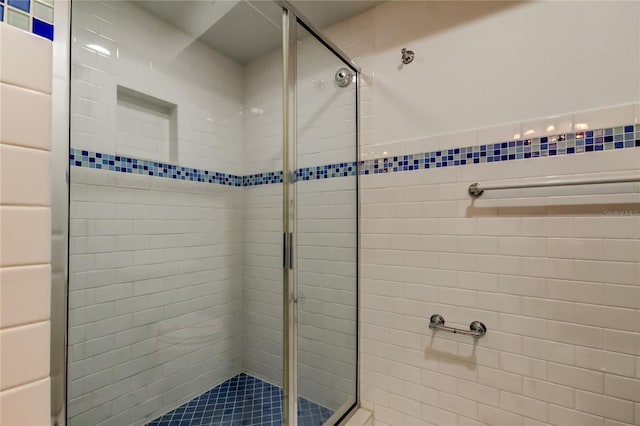 full bathroom with a shower stall