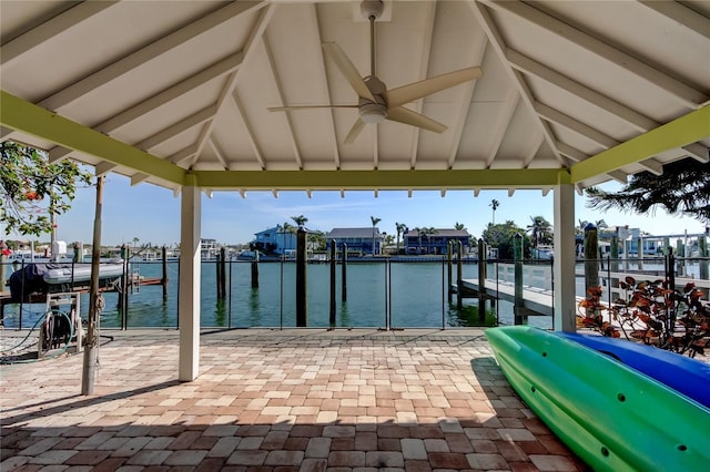 dock area with a gazebo and a water view