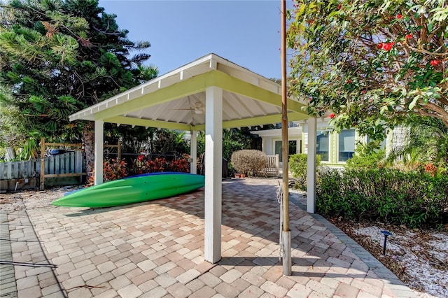 view of patio / terrace featuring fence