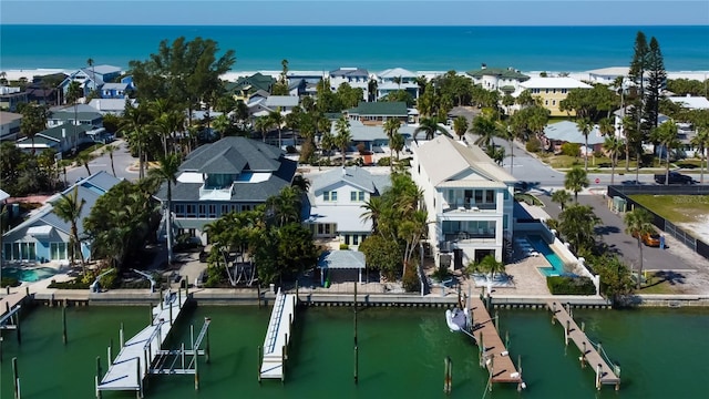 aerial view with a residential view and a water view