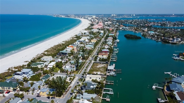 aerial view with a water view and a view of the beach