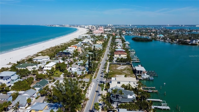 aerial view featuring a water view and a beach view