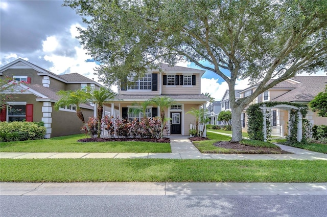 view of front of home with a front lawn