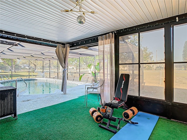 exterior space with a lanai, a fenced in pool, and a patio