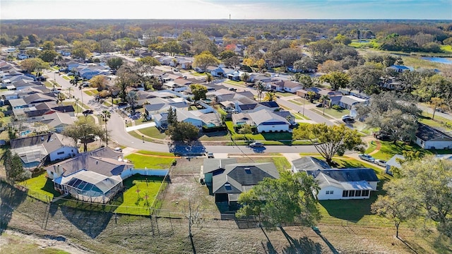 aerial view with a residential view and a water view