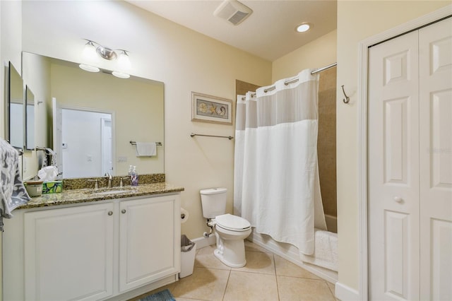 full bathroom with tile patterned flooring, visible vents, toilet, shower / tub combo, and vanity