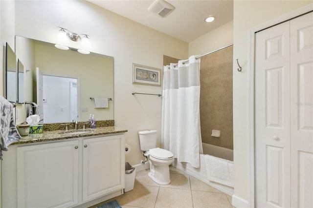 full bathroom featuring vanity, visible vents, shower / tub combo, tile patterned floors, and toilet