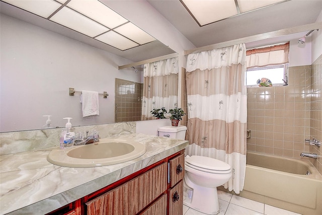 full bathroom featuring vanity, tile patterned floors, shower / bath combination with curtain, and toilet