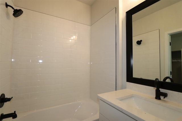 bathroom featuring vanity and shower / tub combination