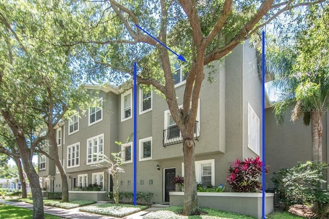 view of building exterior with a residential view