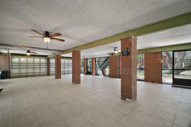 garage featuring a ceiling fan